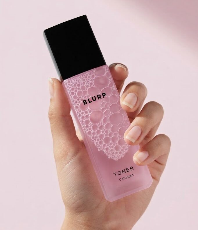 Holding a hydrating toner bottle for a daily korean skincare routine